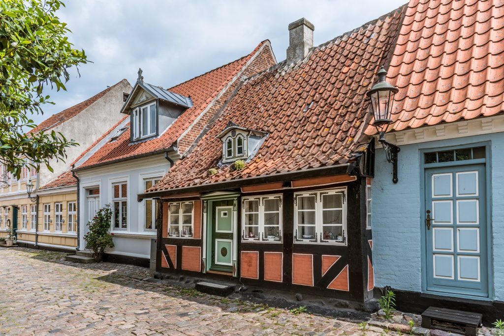 A romantic fairytale halftimbered house on a cobblestone street